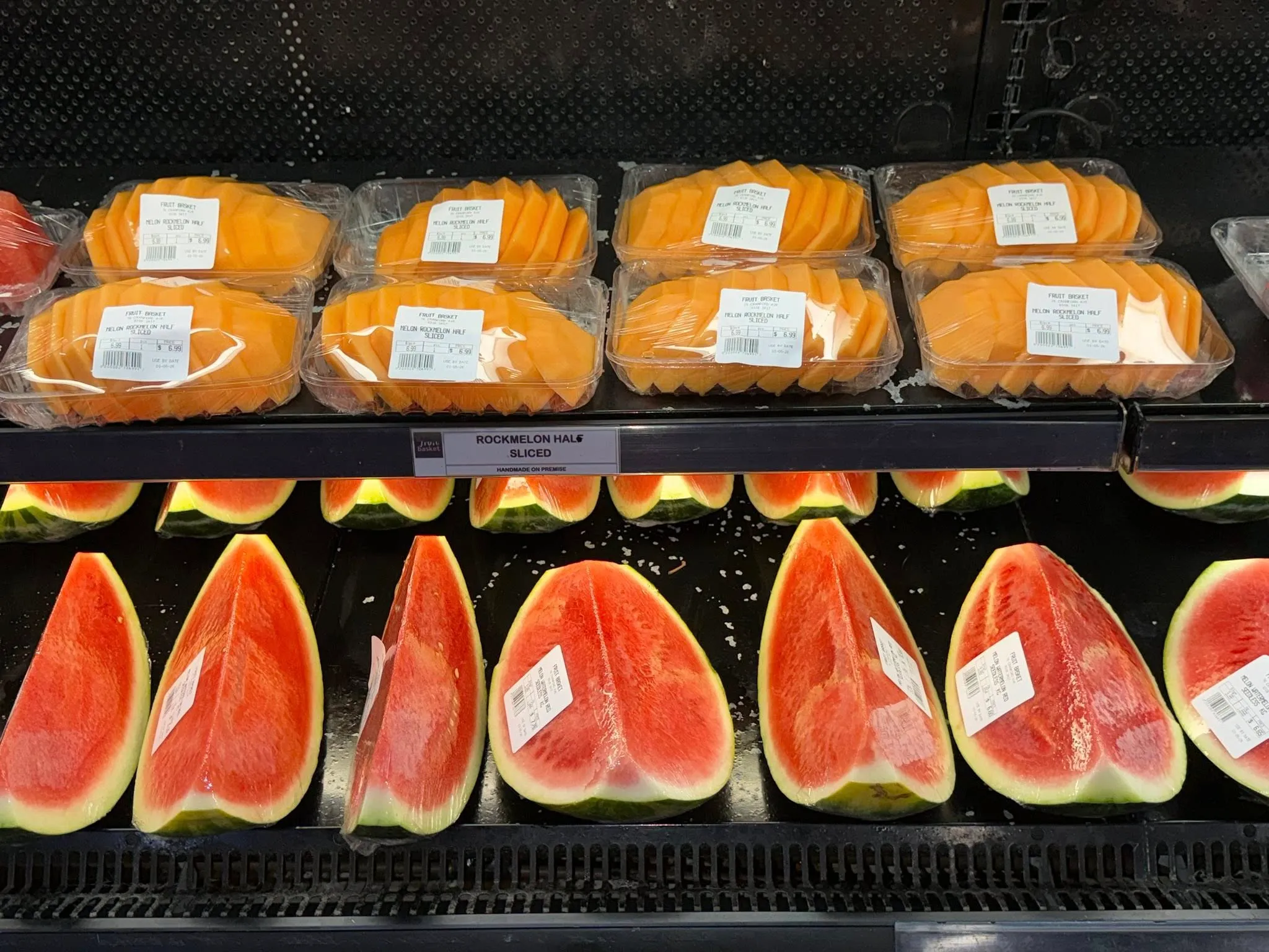 Cured meat and smoked salmon platter with watermelon slices