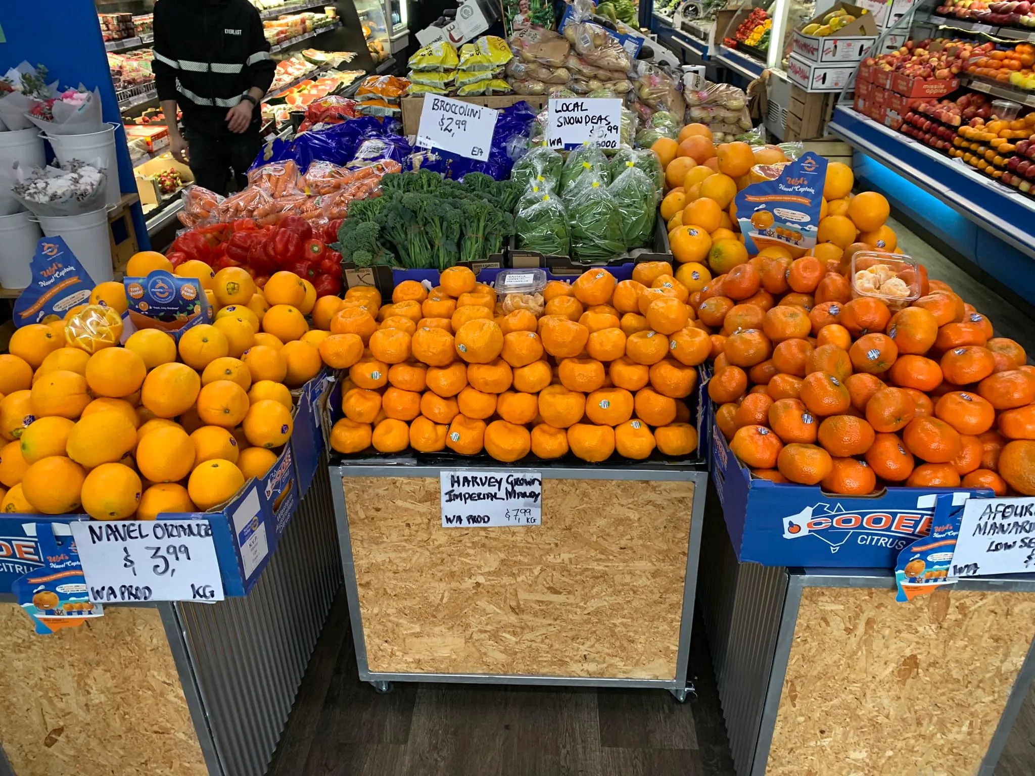 Inside the shop, citrus and produce display
